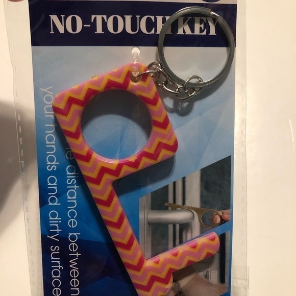5/$10 New! No touch key Pink and Yellow Conveniently attaches to your key ring - Picture 2 of 3